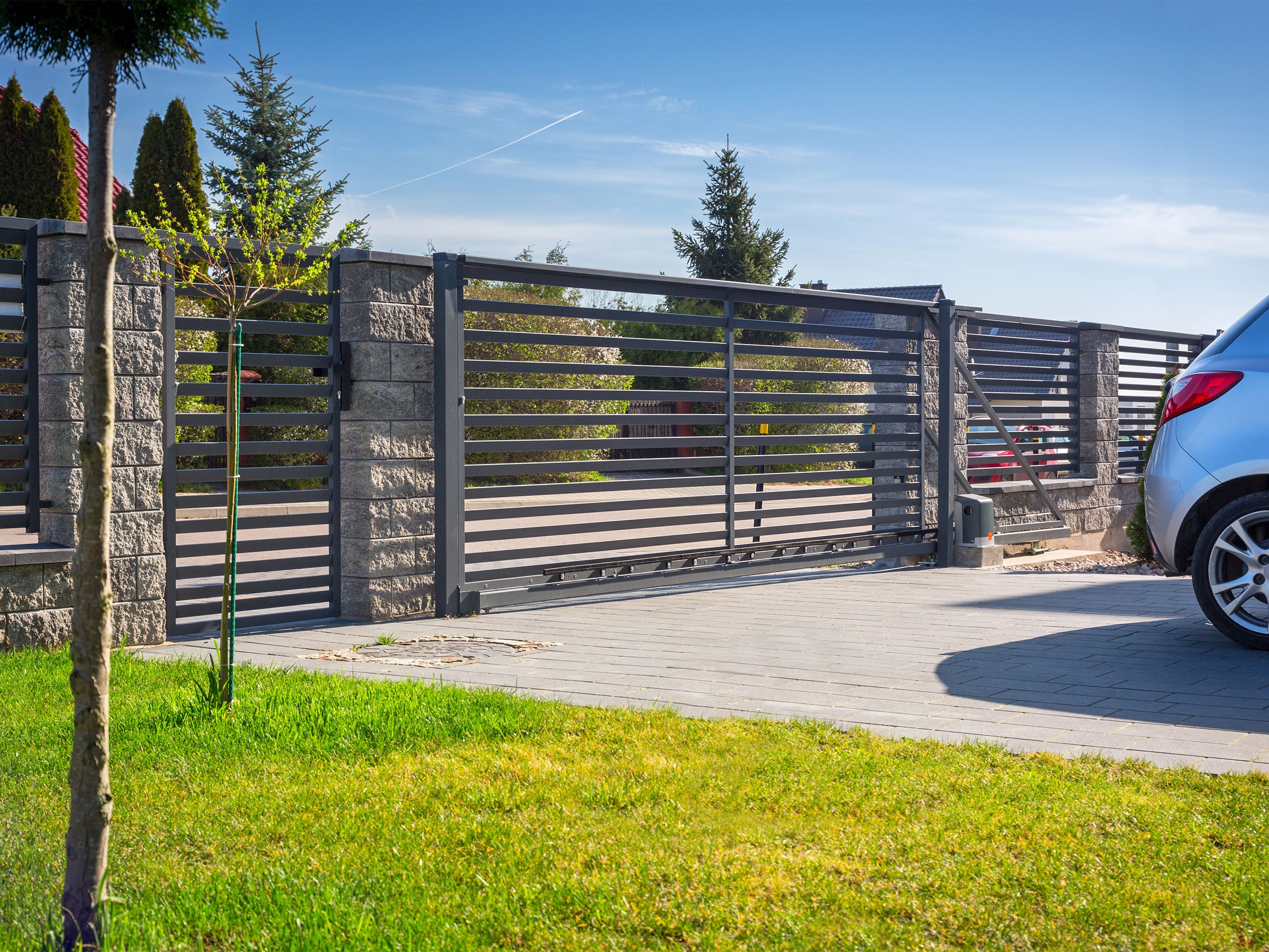 beautiful grey colored gate installed on a residential property.